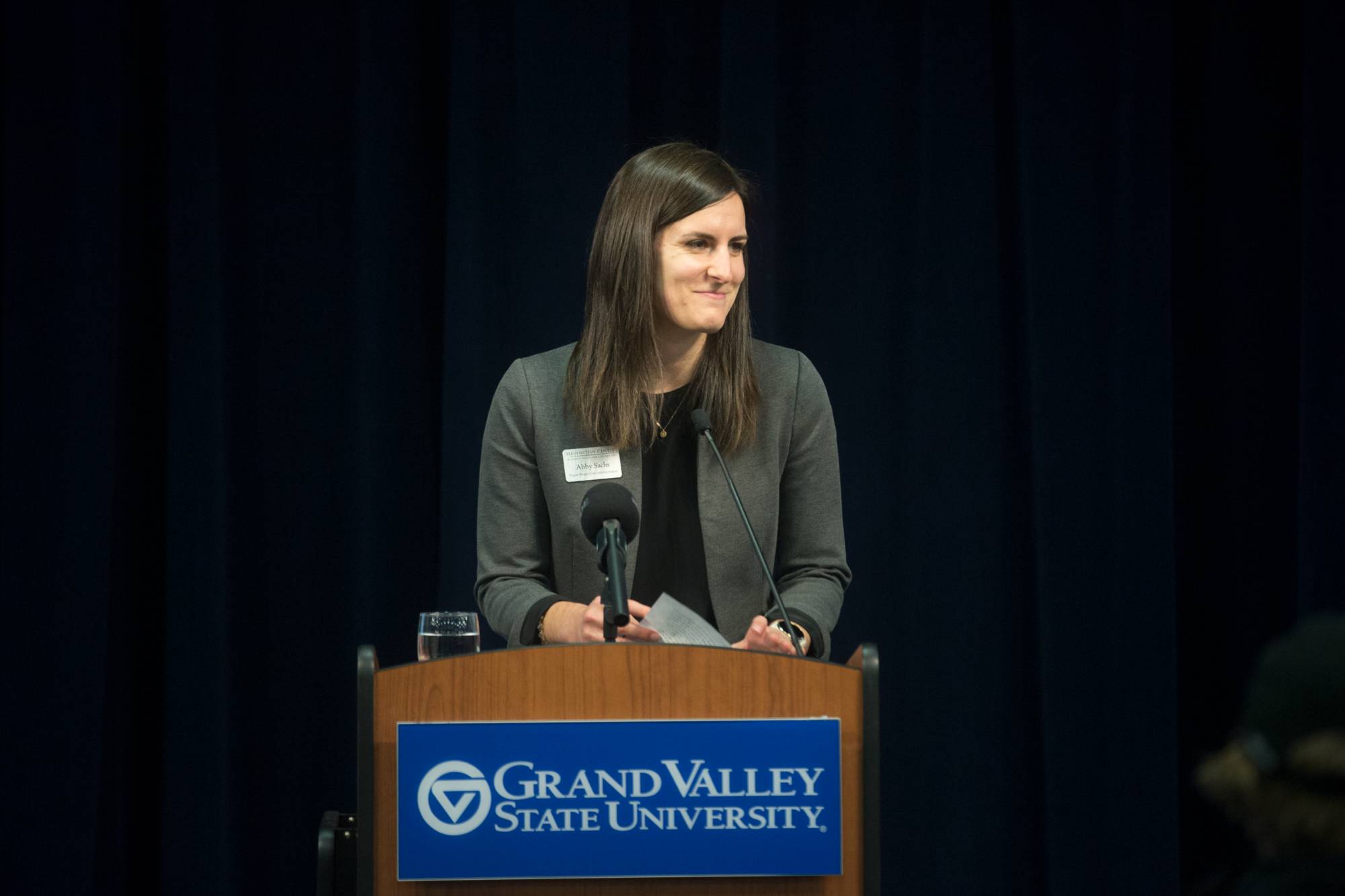 abby sachs speaking at event